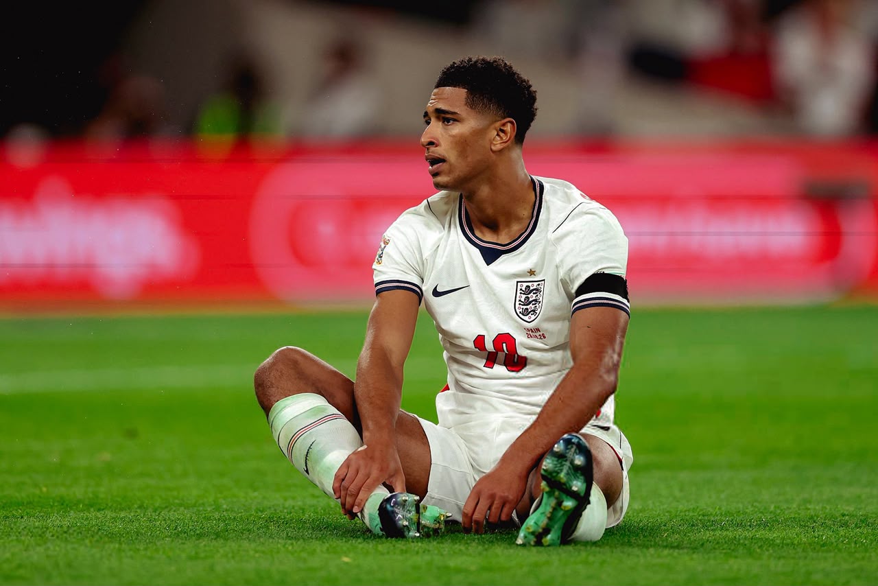 Jude Bellingham sitting on the pitch after England’s defeat to Spain